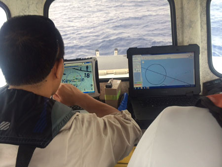 Justin Rivera from PMNM monitors the Puma and Wave Glider controls stations