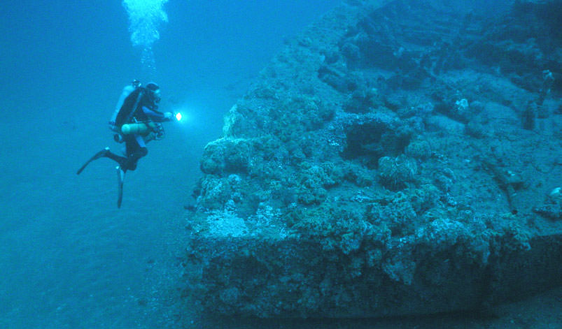 Photo of a diver and the uss monitor