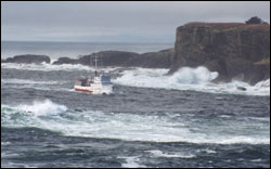 Figure 14. The wild coastline leading to the western entrance of the Strait of Juan de Fuca, the passageway for ships bound to major ports in the Pacific Northwest, is unforgiving to vessels whose bearings, visibility or propulsion are compromised.