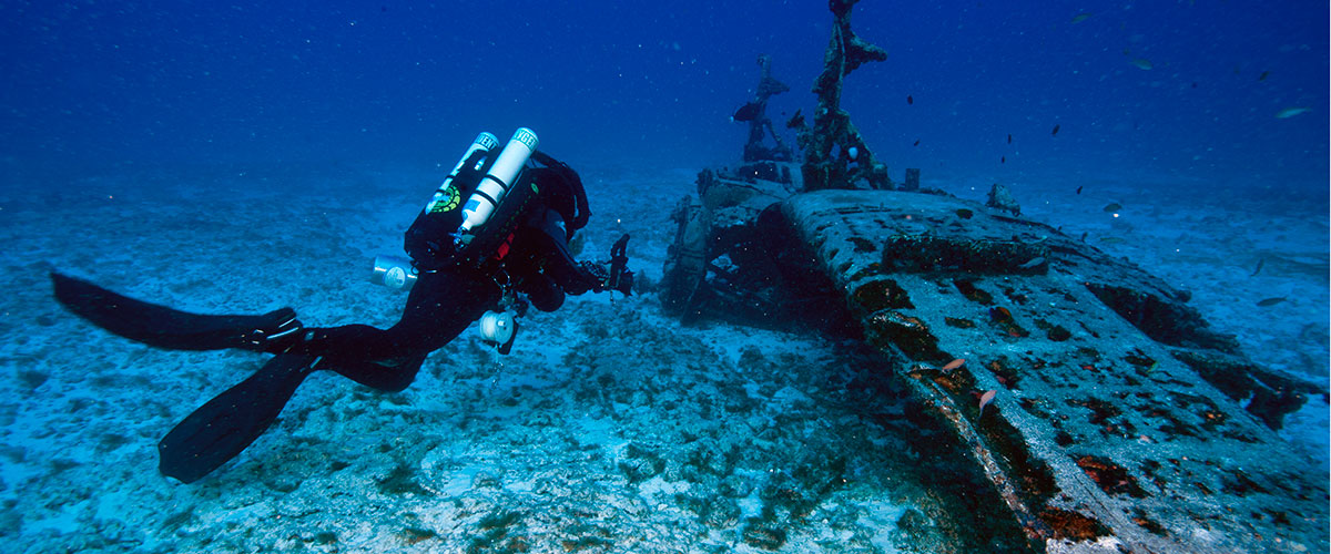 photo of diver monitoring underwater