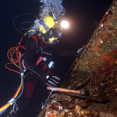 diver working on monitor wreck