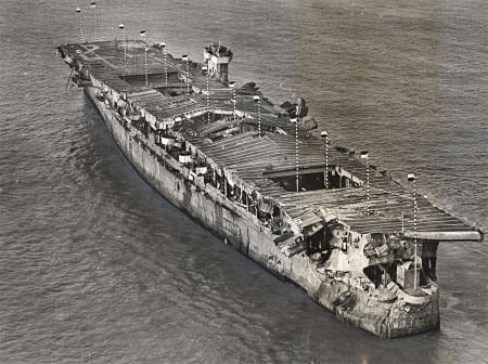 visible damage on uss independence from the atomic bomb tests