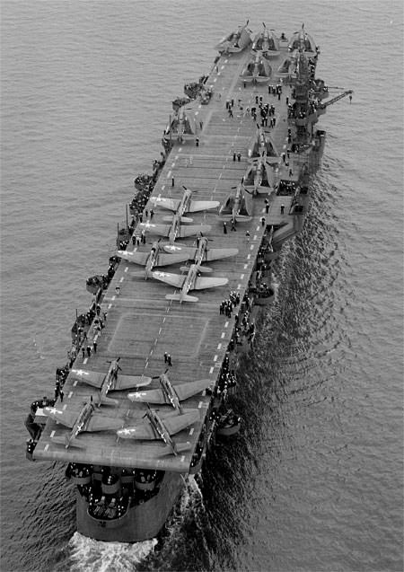 Aerial view of USS Independence, aircraft visible on deck