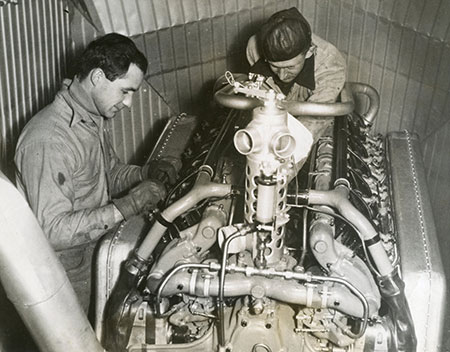 photo of crew working on the USS macon engine