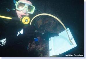 SCUBA student with clipboard
