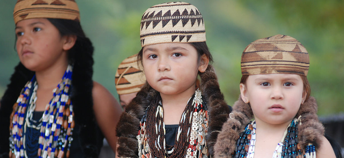photo of children wearing tribal outfits